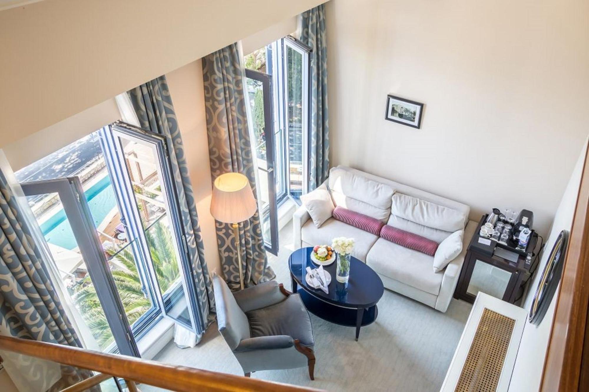 Hotel Park Split Exterior photo A living room in a duplex suite at the Mandarin Oriental, Munich